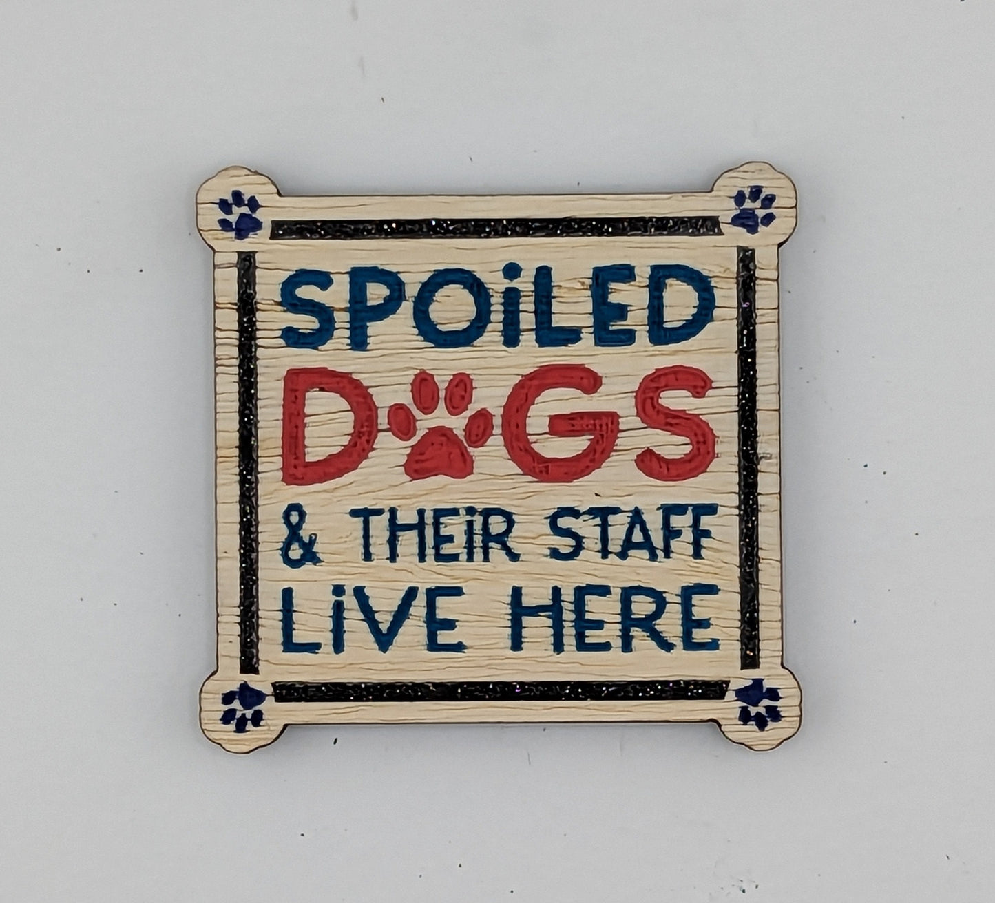 A spoiled dog and his staff live here, hand painted laser engraved magnet
