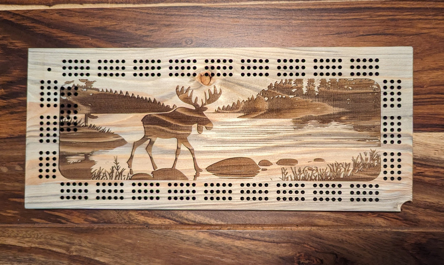 Moose walking in a river, 3 Track Cribbage Board - Laser engraved