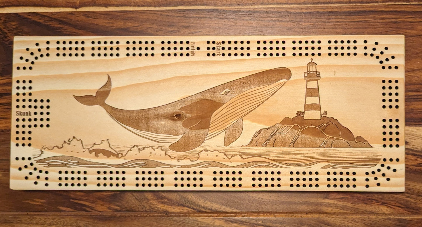 Whale jumping out of the ocean with a lighthouse, 3 Track Cribbage Board - Laser engraved